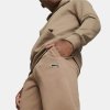 Puma spodnie dresowe brązowe 676816 85