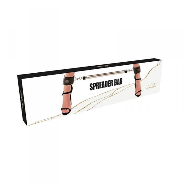 Spreader bar with ankle cuffs