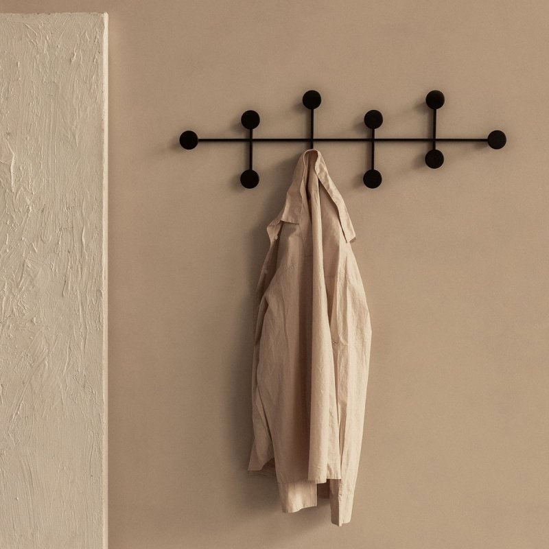 Czarny wieszak ścienny Afteroom Audo o minimalistycznej formie