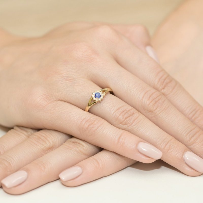 Pierścionek złoty 585 z brylantami 0,09ct tanzanitem 0,15ct W-118