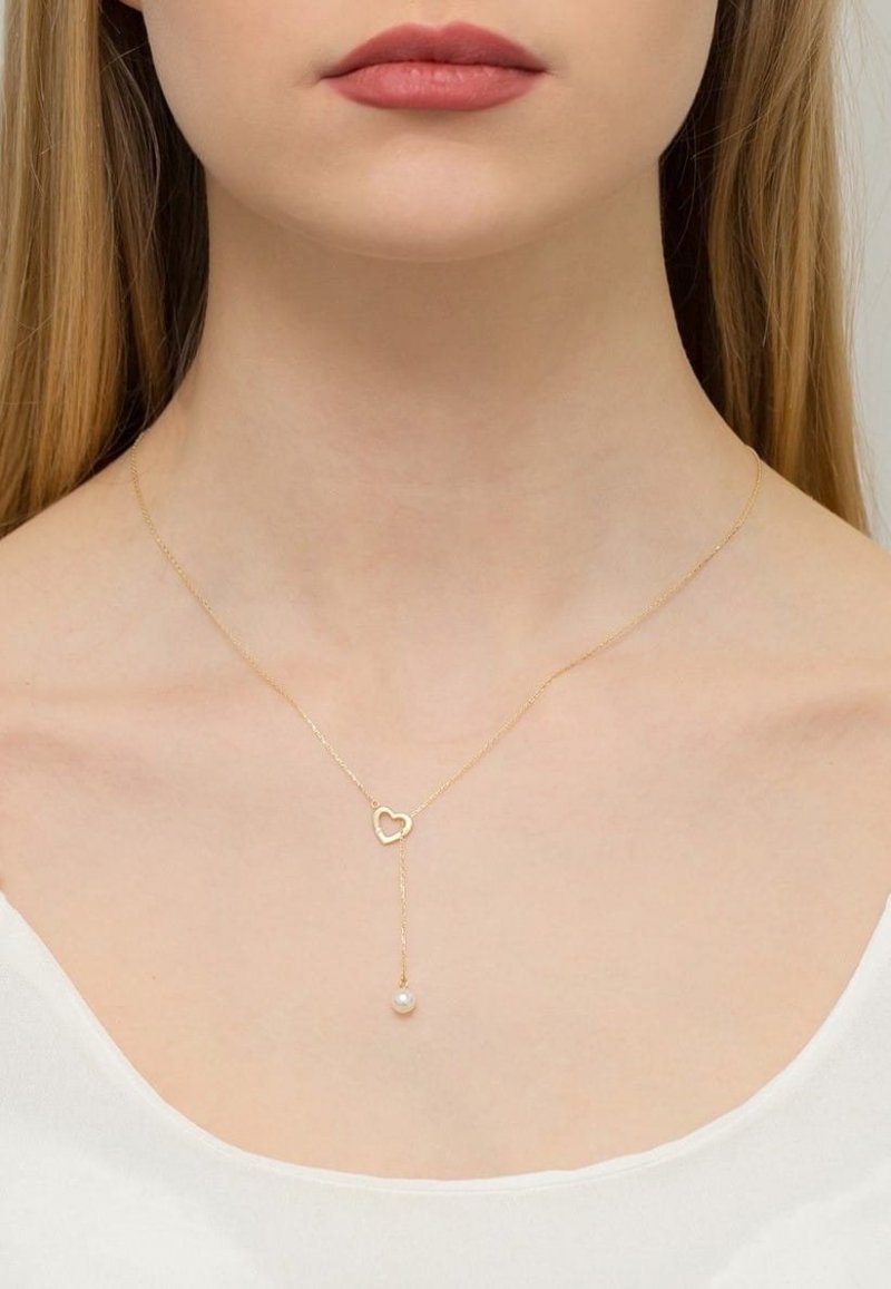 Łańcuszek złoty 585 serduszko z brylantem 0,01ct C-52