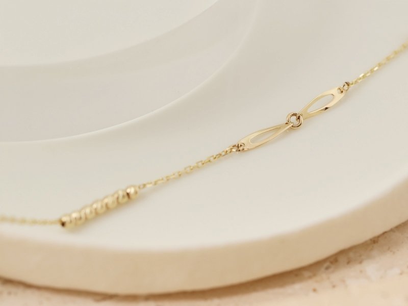 Bransoletka złota 375 delikatna kuleczki łańcuszkowa
