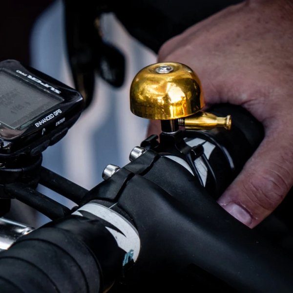 Dzwonek rowerowy Lezyne Classic Brass Bell S — polerowany mosiądz, czarna baza