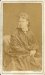 [FOTOGRAFIA portretowa - portret kobiety]. [1875]. Fotografia form. 9,3x5,4 cm na oryg. podkładzie form. 10,5x6,3 cm wykonane w atelier Bronisława Mariona w Warszawie.