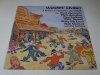 Rod Clements, Dick Gaughan, Ray Jackso , Bert Jansch, Rory McLeod, Rab Noakes With Pat Rafferty - Woody Lives! A Tribute To Woody Guthrie (LP)