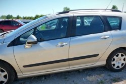 Szyba drzwi przód lewa Peugeot 308 I SW 2009 (2007-2011) Kombi