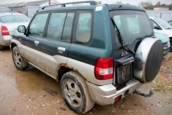 Podnośnik szyby tył lewy Mitsubishi Pajero Pinin 2003