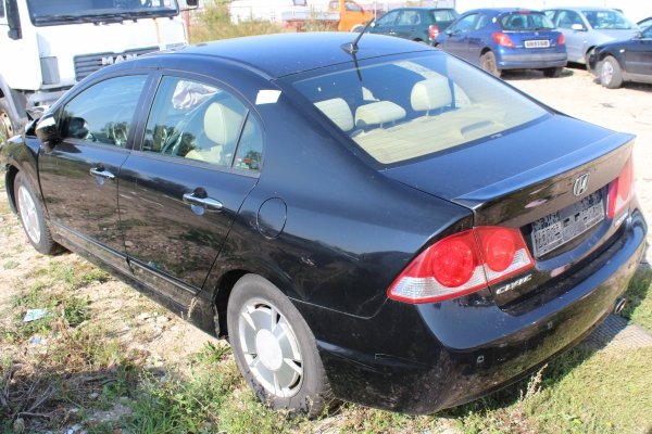 Zamek drzwi przód lewy Honda Civic Hybrid VIII FD 2007 Sedan 