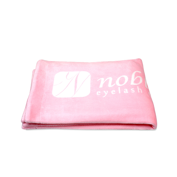 Blankets with the Noble Lashes logo