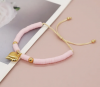 GOLDENES ARMBAND MIT EDELSTAHL