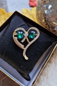 elegant gold brooch