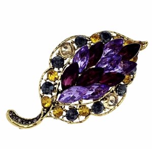 элегантная золотая брошь