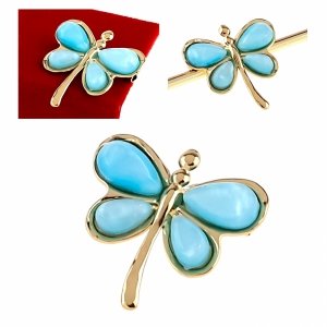 элегантная золотая брошь