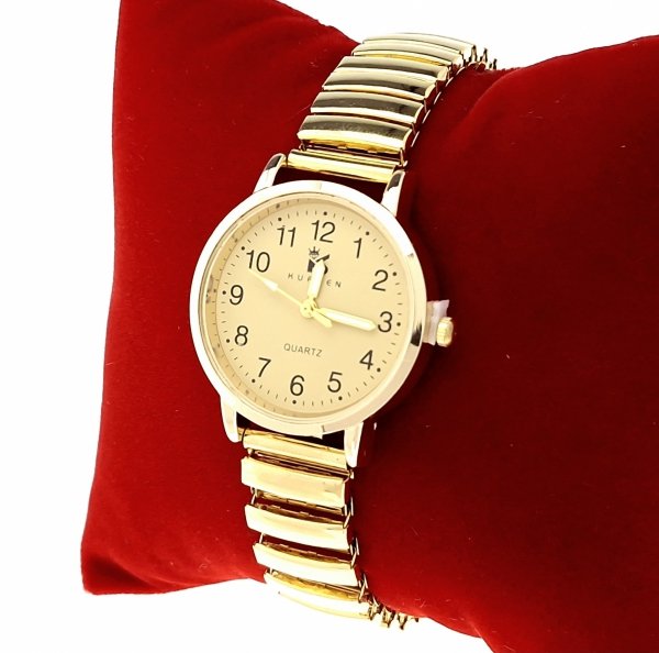 OMAS UHR GOLD GROßE ZAHLEN AUF DEM RADIERGUMMI
