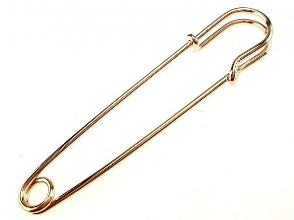 elegante Goldbrosche