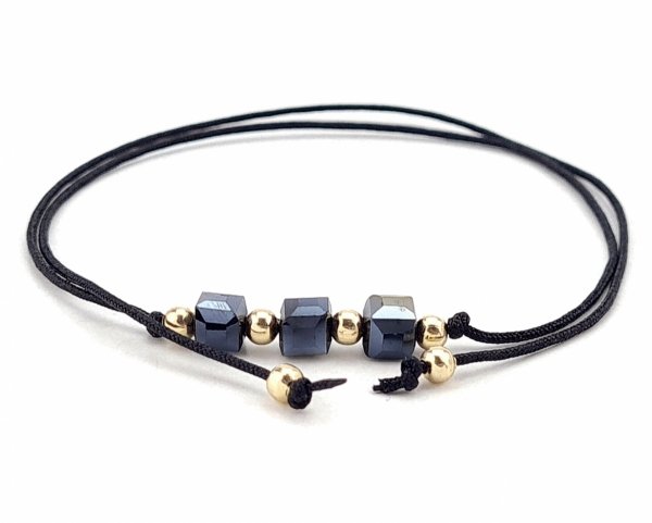 GOLDENES ARMBAND MIT EDELSTAHL