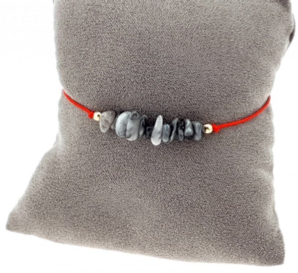 GOLDENES ARMBAND MIT EDELSTAHL