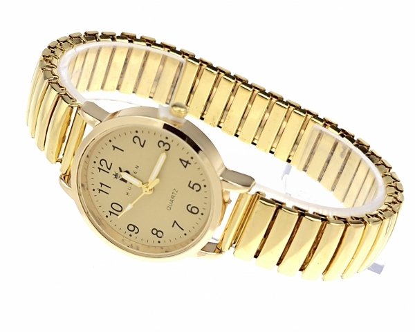 OMAS UHR GOLD GROßE ZAHLEN AUF DEM RADIERGUMMI