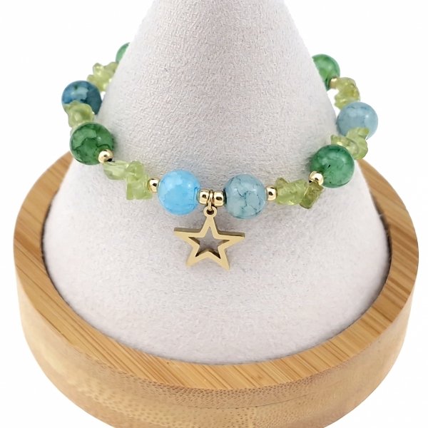 2325j Bransoletka akwamaryn oliwin kamień na gumce jubilerskiej gwiazda