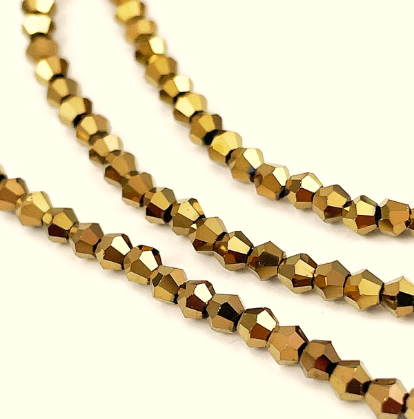 310a Przezroczyste galwanizowane koraliki szklane, fasetowane, platerowane antycznym brązem, 2,9~3,3 x 2,5 mm, otwór: 0,7 mm, około 135~140 szt./pasmo, 38~40 cm