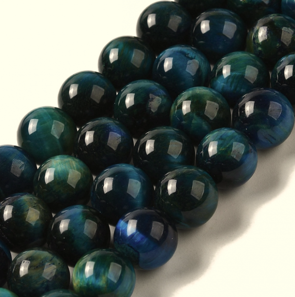 1685 Koraliki naturalne tygrysie oko 10mm okrągłe, niebieskie otwór: 1,4mm 