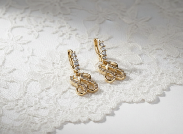 550c Kolczyki złote pozłacane cyrkonie wiszące 14K znak nieskończoności 