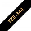 Taśma Brother TZE-344. złoty druk/czarny podkład. laminowane. 8m. 18mm TZE344