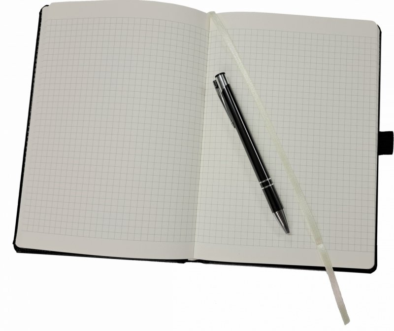 Środek notesu A5 w kratkę z długopisem