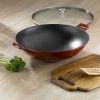 KELA-Wok żeliwny +pokrywa 4 l czerwony Calido
