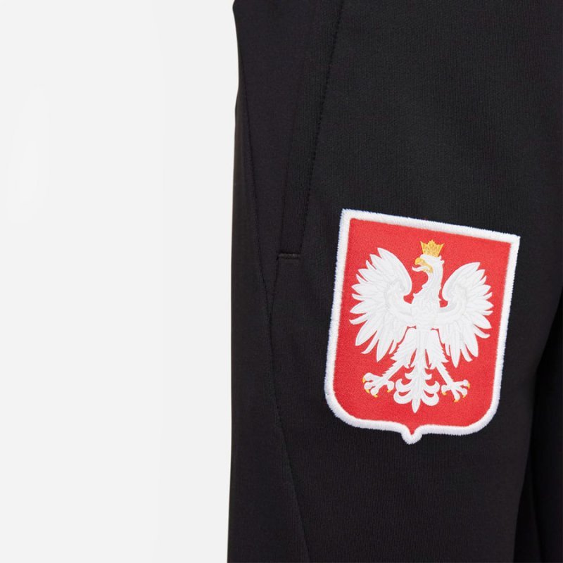 Spodnie Nike Polska Strike Jr DM9600 010 czarny L (147-158cm)