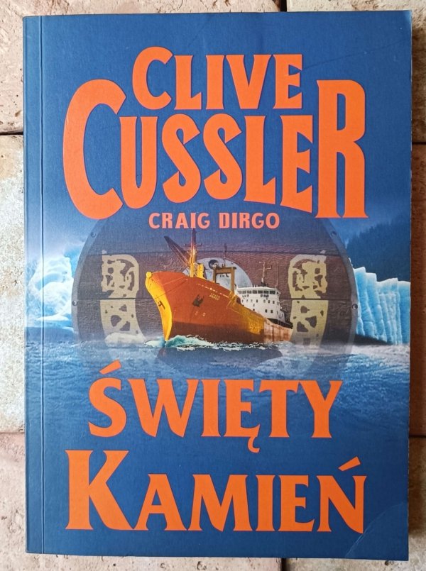 Clive Cussler • Święty kamień - okładka