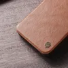 Nillkin Qin Leather Pro Case etui iPhone 14 Plus osłona na aparat kabura pokrowiec obudowa z klapką brązowy