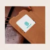 Nillkin Qin Leather Pro Case etui do Samsung Galaxy S22+ (S22 Plus) osłona na aparat kabura pokrowiec obudowa z klapką brązowy