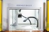 Laser-marking cabinet with automatic door and motorized axis