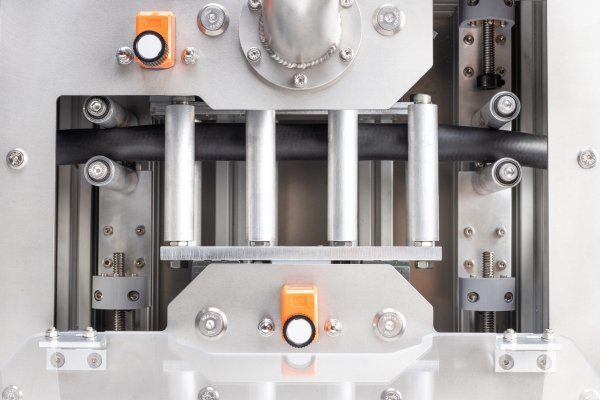 A marking station for rubber cables on an extrusion line