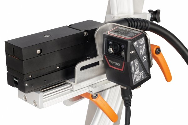 Coding station with radial printhead adjustment mechanism