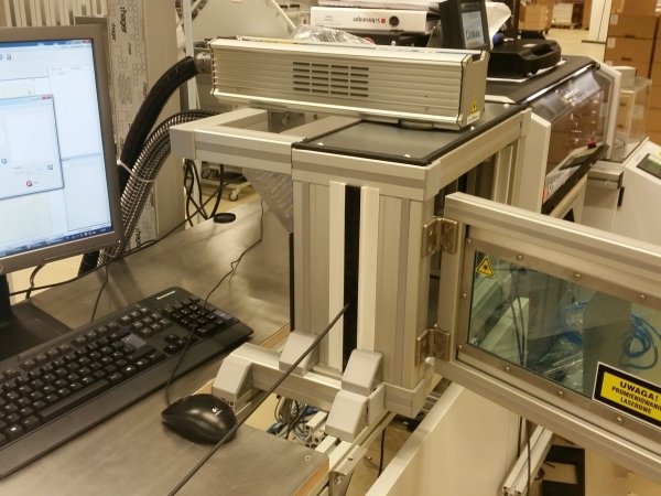 Laser cabinet for the use in cable marking
