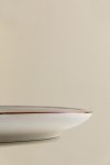 Zestaw 4 talerzy deserowych Bremen z porcelany o pastelowych kolorach i nieregularnym wykończeniu, idealny do stylu boho i eleganckich aranżacji stołu