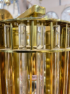 Wytworna lampa stołowa TOWER stojąca z metalu i kryształu o cylindrycznym kształcie glamour złota