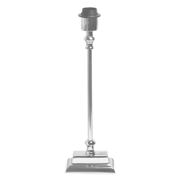 Elegancka, niklowana lampka stołowa na efektownej prostokątnej podstawie. Niklowana lampka z odpowiednio dobranym abażurem to bardzo elegancki dodatek do każdego rodzaju wnętrza.