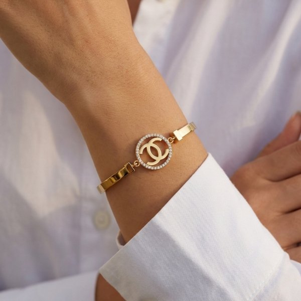 Bransoletka półsztywna litery złoto 585 