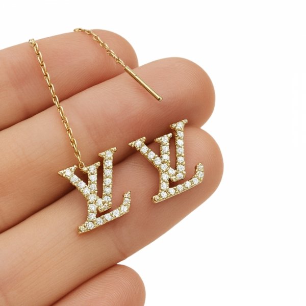  Kolczyki przewlekane litery z kamieniami złoto 585 