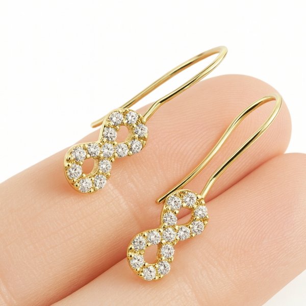 Kolczyki znak nieskończoności bigiel złoto 585 