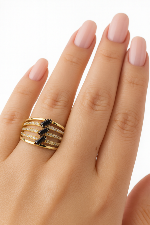 Pierścionek z kamieniami bagietkowymi R.16 złoto 585