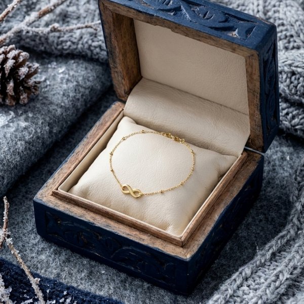 Bransoletka kule z motywem nieskończoności  złoto 375