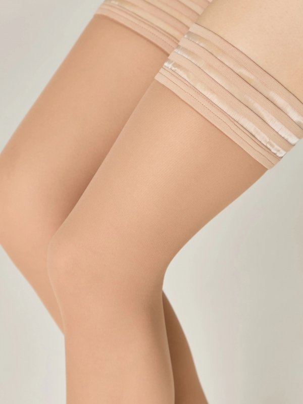 CONTE CABARET to cienkie pończochy damskie 30 DEN o modnym efekcie siateczki. Samonośna gumka z silikonem gwarantuje stabilność i komfort noszenia przez cały dzień.