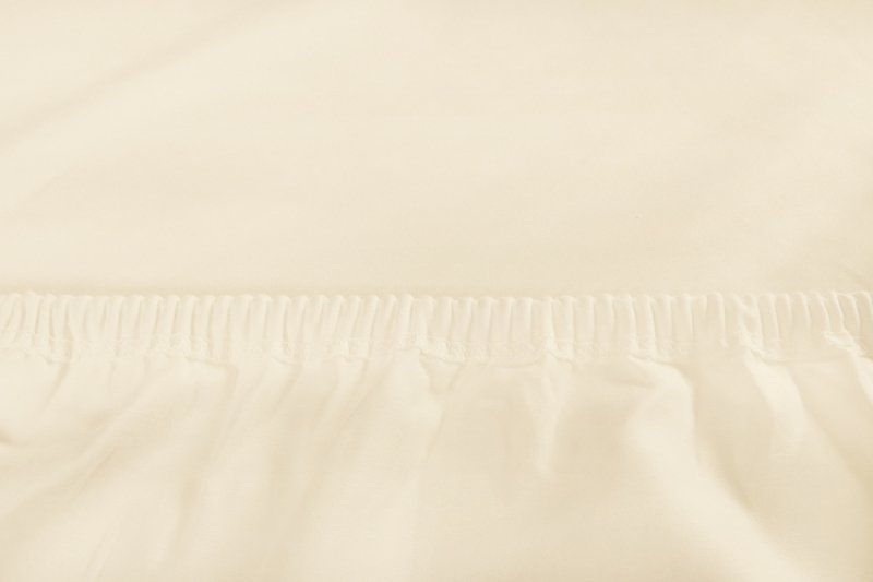 Prześcieradło PREMIUM jersey z lycrą na wysoki materac 160x200 z gumką wz. 02A kremowy